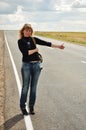 Woman hitchhiking, Road Trip