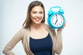 Woman hold alarm clock. White background isolated. Royalty Free Stock Photo