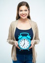 Woman hold alarm clock. White background isolated. Royalty Free Stock Photo