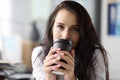 Woman hold black paper moog with coffee Royalty Free Stock Photo