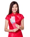 Woman hold lucky money with RMB Royalty Free Stock Photo