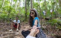 Woman Hold Man Hand, Couple With Backpacks Trekking On Forest Path, Tourists On Hike