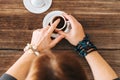 Woman hold the mug and telling fortune with traditional turkish coffee cup. Royalty Free Stock Photo