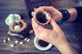 Woman hold the mug and telling fortune with traditional turkish coffee cup. Royalty Free Stock Photo