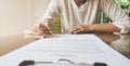 Woman hold pen for signature on contract document in business concept Royalty Free Stock Photo