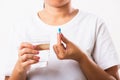 Woman hold pill drugs in hand ready take medicines with a glass of water