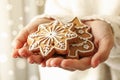 Woman hold tasty Christmas cookie, close up Royalty Free Stock Photo