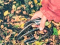 Woman hold wornout horsehoes just removed from hooves Royalty Free Stock Photo