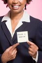 Woman holding an adhesive note Royalty Free Stock Photo