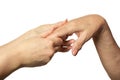 Woman holding adult daughters hands on white background