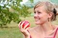 Woman holding apple Royalty Free Stock Photo