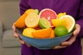 Woman Holding Assorted Citrus Fruit Royalty Free Stock Photo