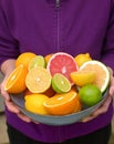 Woman Holding Assorted Citrus Fruit Royalty Free Stock Photo