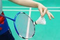 Woman holding a badminton racket ready to hit shuttecock Royalty Free Stock Photo
