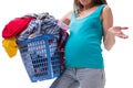 The woman holding basket of dirty clothing requiring washing Royalty Free Stock Photo