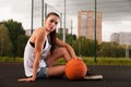 Woman Holding Basketball In Hand