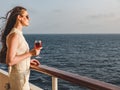 Woman holding a beautiful glass of pink wine