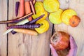 Woman holding beet with colorful carrots Healthy Eating Fall Harvest Food