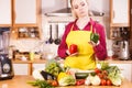 Woman holding bell peppers paprika thinking