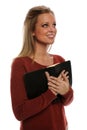 Woman holding bible