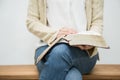 Woman holding bible