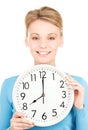 Woman holding big clock Royalty Free Stock Photo