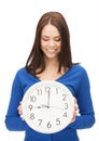 Woman holding big clock Royalty Free Stock Photo
