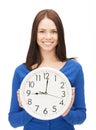 Woman holding big clock Royalty Free Stock Photo