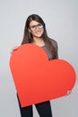 Woman holding big heart shape Royalty Free Stock Photo