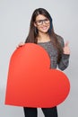 Woman holding big heart shape Royalty Free Stock Photo