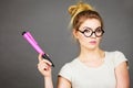 Woman holding big oversized pencil thinking about something Royalty Free Stock Photo