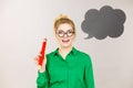 Woman holding big oversized pencil thinking Royalty Free Stock Photo