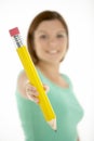 Woman Holding Big Pencil Royalty Free Stock Photo