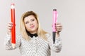 Woman holding big pencil and pen Royalty Free Stock Photo