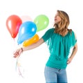 Woman holding big red balloon above her head