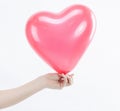 Young woman holding a big red heart.isolated on white. Royalty Free Stock Photo