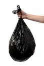 Woman holding bin bag full of garbage on white background Royalty Free Stock Photo