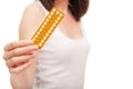 Woman holding birth control pills Royalty Free Stock Photo
