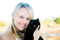 Woman Holding Black Cat Royalty Free Stock Photo