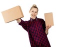 Woman holding blank cardboard boxes in hands on white background Royalty Free Stock Photo