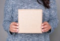 Woman holding blank carton box. Mockup for design Royalty Free Stock Photo