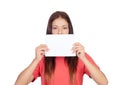 Woman holding a blank paper covering her mouth Royalty Free Stock Photo