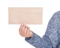 Woman holding blank paper envelope isolated. Mockup for design Royalty Free Stock Photo