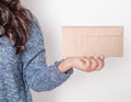 Woman holding blank envelope. Mockup for design Royalty Free Stock Photo