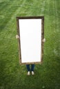 Woman Holding Blank Rectangular Frame