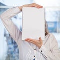 Woman holding blank ring-bound notebook Royalty Free Stock Photo