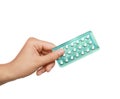 Woman holding blister of oral contraception pills on white background, closeup Royalty Free Stock Photo