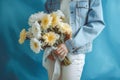 romantic woman bouquet flower birthday yellow floral sweater blue hand white. Generative AI. Royalty Free Stock Photo