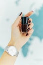 Woman Holding A Bottle Of Red Nail Polish Royalty Free Stock Photo