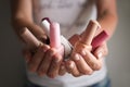 Woman holding bottles of colorful nail polishes, closeup Royalty Free Stock Photo